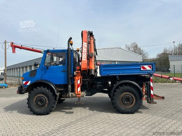 Automobilis ar plakanu platformu UNIMOG U 427 4x4 / Kran Atlas 130 / Winde