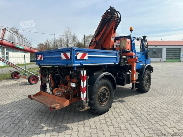 Automobilis ar plakanu platformu UNIMOG U 427 4x4 / Kran Atlas 130 / Winde