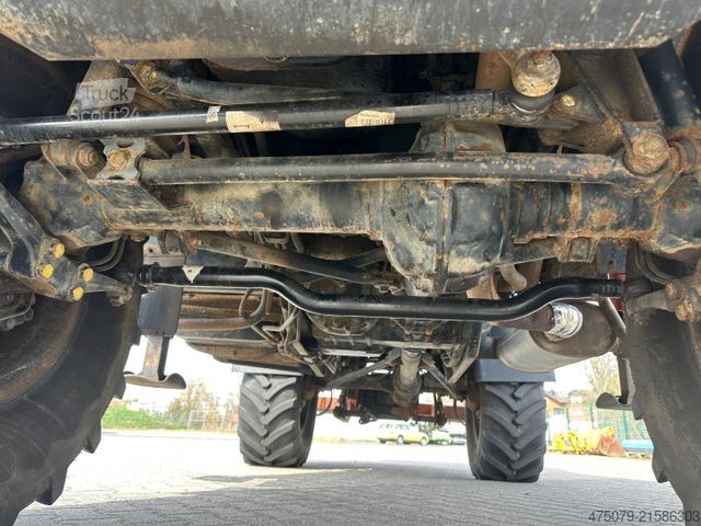 Automobilis ar plakanu platformu UNIMOG U 427 4x4 / Kran Atlas 130 / Winde