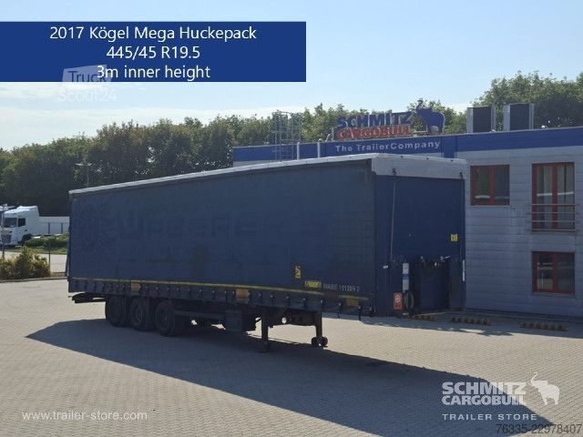 Avoin puoliperävaunu pressulla Kögel Curtainsider Mega