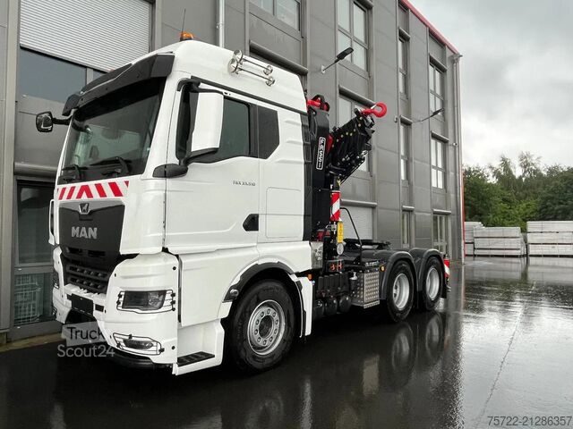 Carico pesante MAN TGX 33.520 6x4 BL FASSI F485RA.2.28