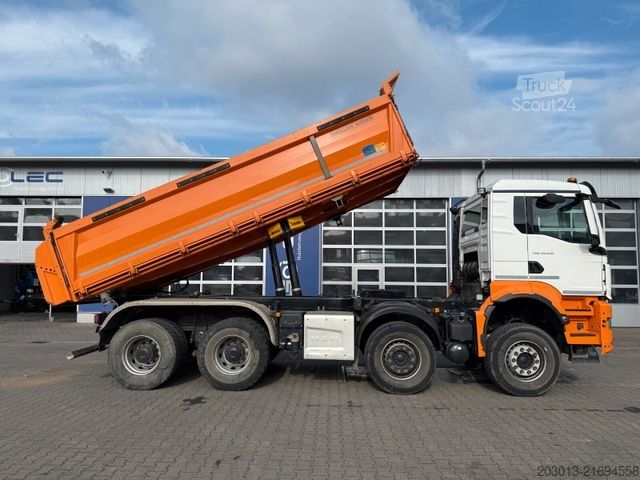 Tipper truck MAN TGS 35.510 8x4 BB Kipper Meiller Bordmatic *AHK