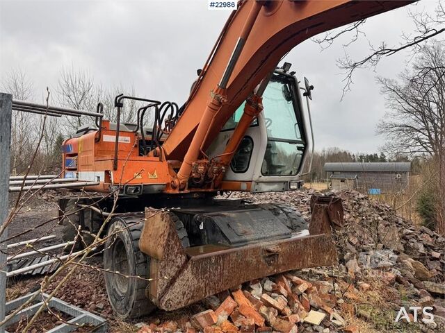 Riteņu ekskavators Fiat-Hitachi 150W.3 wheeled excavator with rototilt and grading