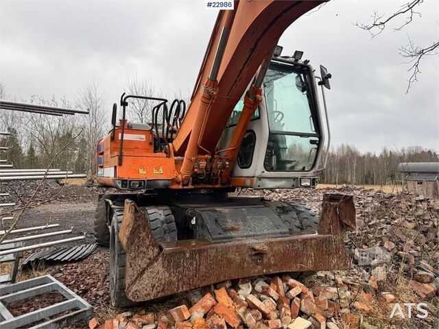 Riteņu ekskavators Fiat-Hitachi 150W.3 wheeled excavator with rototilt and grading