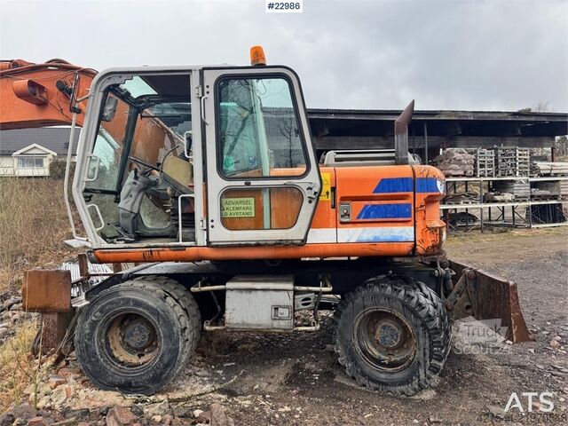 Riteņu ekskavators Fiat-Hitachi 150W.3 wheeled excavator with rototilt and grading