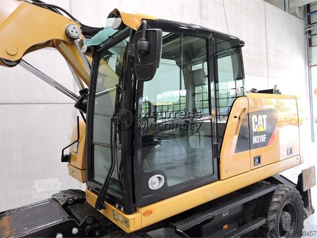 Kolesový bager CATERPILLAR M318F