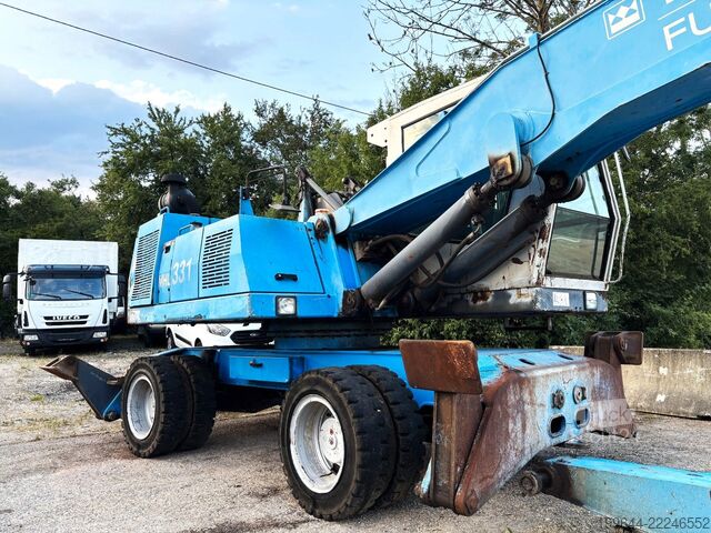 Колёсный экскаватор FUCHS MHL 331 Magnetanlage TEREX