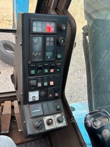 Колёсный экскаватор FUCHS MHL 331 Magnetanlage TEREX