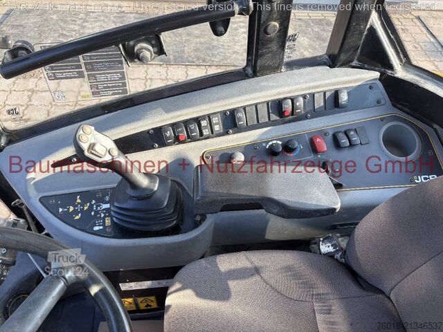 Radlader JCB 409 gebraucht Lader Baumaschine