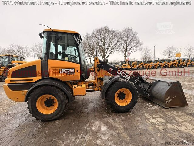 Radlader JCB 409 gebraucht Lader Baumaschine