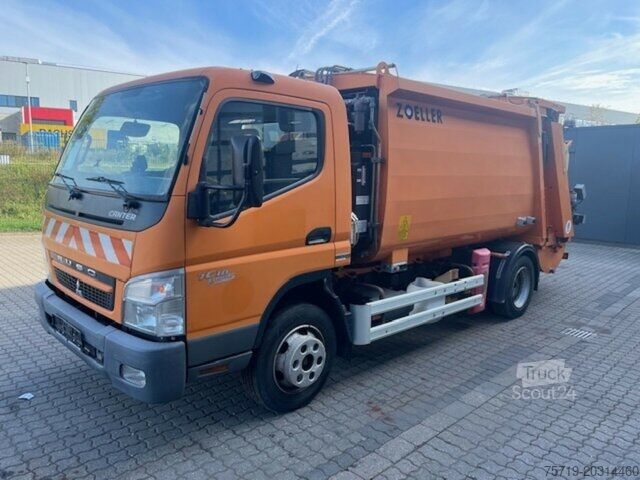 Мусоровоз Mitsubishi Kanter 4x2 FE85 7c18 Zöller 7,49