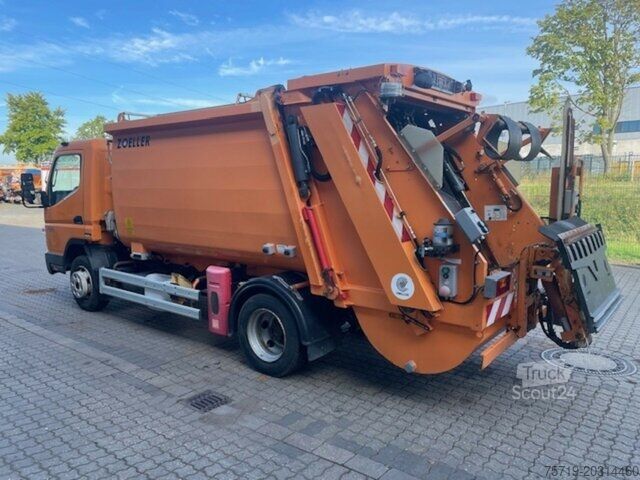 Мусоровоз Mitsubishi Kanter 4x2 FE85 7c18 Zöller 7,49