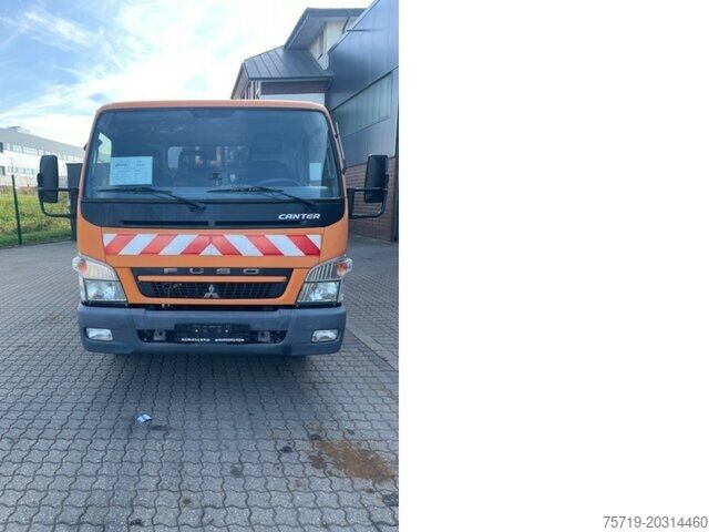 Мусоровоз Mitsubishi Kanter 4x2 FE85 7c18 Zöller 7,49