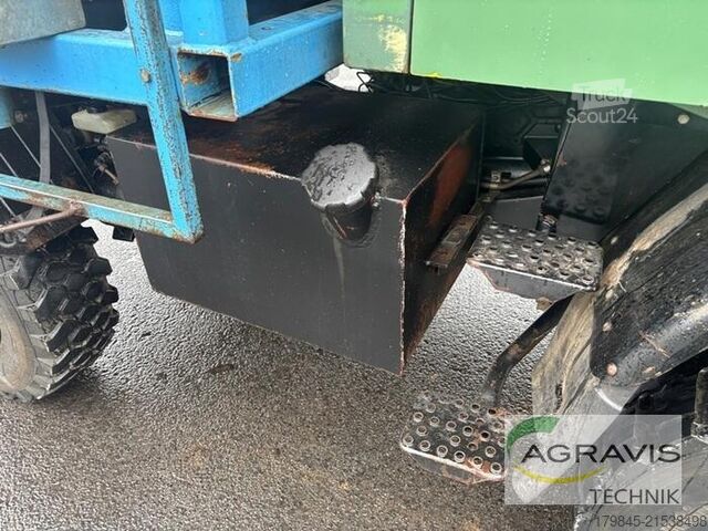 Municipal tractor Daimler Benz UNIMOG 427/10 + Inuma Aufbauspritze Typ 2024