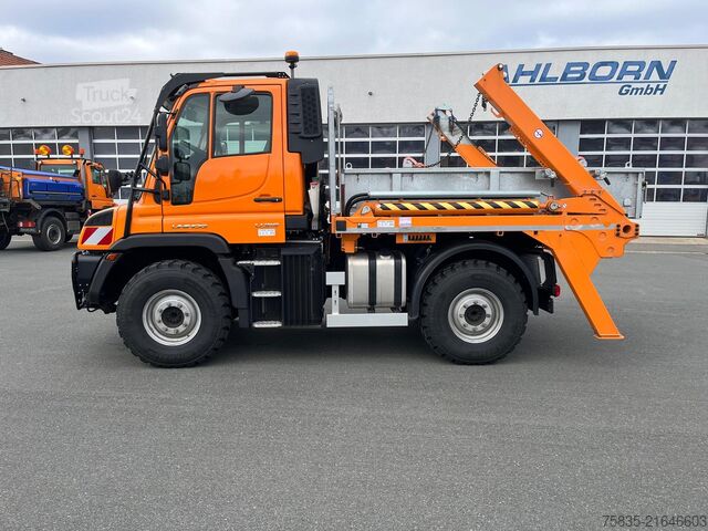 Pašizgāzējs kravas automašīna Mercedes-Benz Unimog U319 mit Jotha CombiCon 5018U