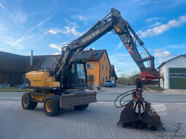 Excavator pe roți VOLVO Mobilbagger EW140C Lehnhoff HS10 Hammer-Scherenh