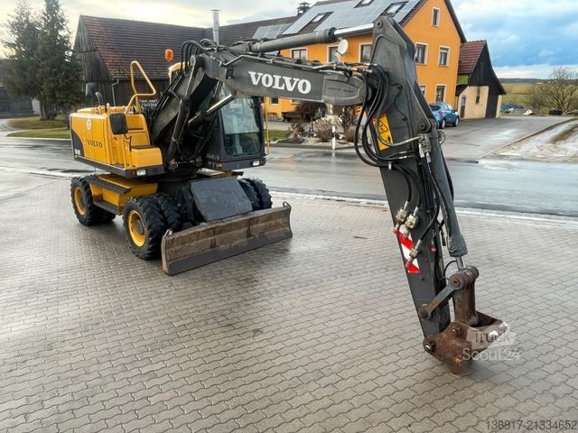 Excavator pe roți VOLVO Mobilbagger EW140C Lehnhoff HS10 Hammer-Scherenh