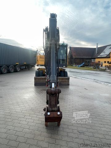 Excavator pe roți VOLVO Mobilbagger EW140C Lehnhoff HS10 Hammer-Scherenh