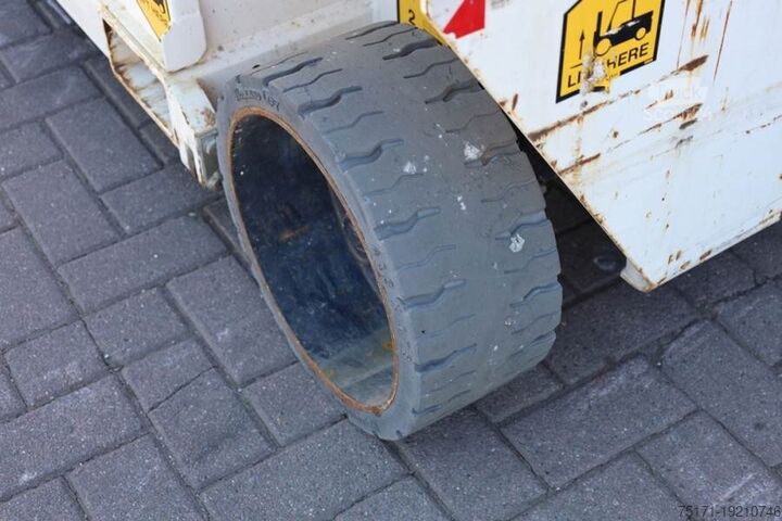 Scissor lift Holland Lift Ecostar HL-9710 Electric, 12m Working Height, 325k