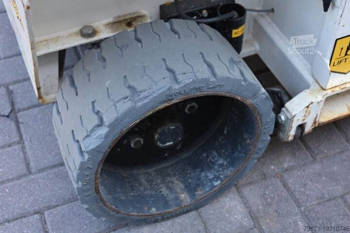 Scissor lift Holland Lift Ecostar HL-9710 Electric, 12m Working Height, 325k