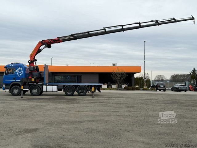 Flatbed truck SCANIA G450 8x4 Pritsche mit Kran Palfinger PK76002 EH