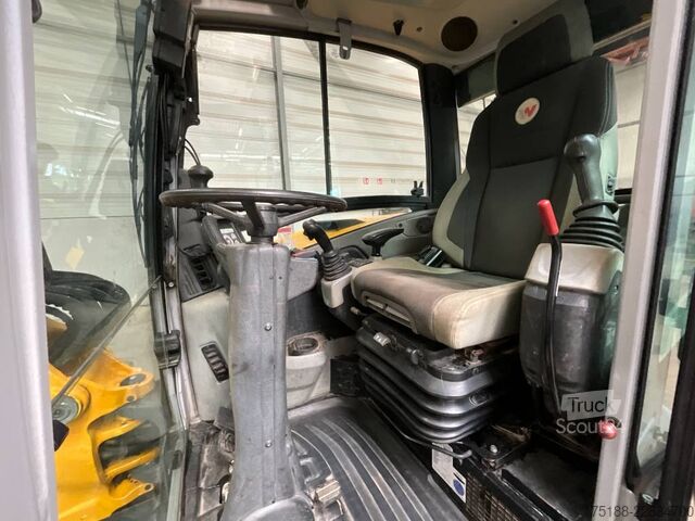 Колесный экскаватор Neuson EW 65 powertilt