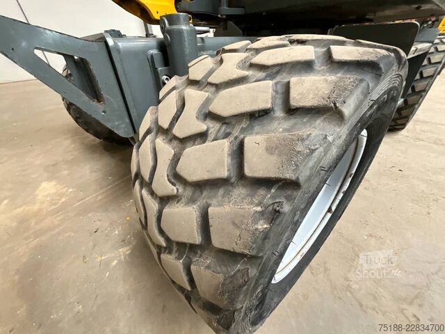 Колесный экскаватор Neuson EW 65 powertilt