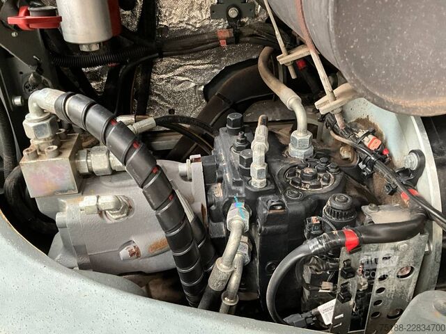 Колесный экскаватор Neuson EW 65 powertilt