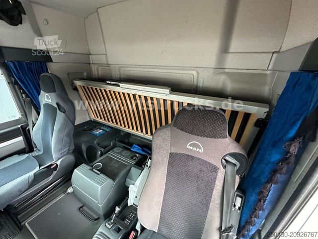 Крюковой мусоровоз MAN TGX 26.480 6x2  Euro6 HIAB-Abrollkipper