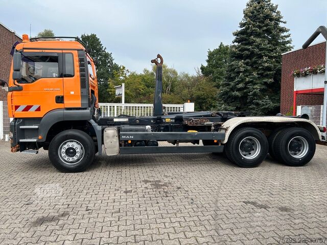 Haakarm vrachtwagen MAN TGA 26.400 MEILLER Abroller mit 13t Achsen 6x4