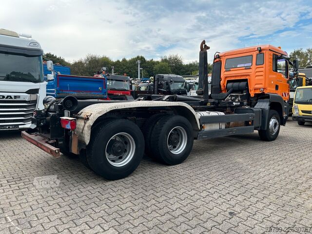 Haakarm vrachtwagen MAN TGA 26.400 MEILLER Abroller mit 13t Achsen 6x4