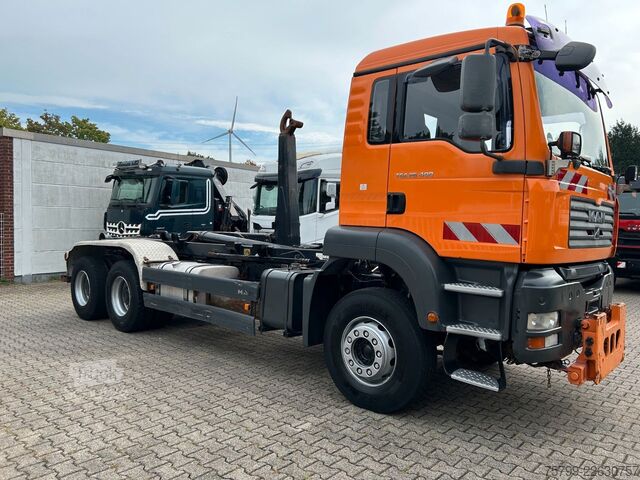 Haakarm vrachtwagen MAN TGA 26.400 MEILLER Abroller mit 13t Achsen 6x4