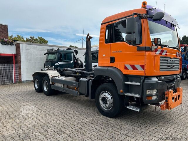 Haakarm vrachtwagen MAN TGA 26.400 MEILLER Abroller mit 13t Achsen 6x4
