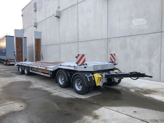 Низкорамный прицеп Möslein T 4 VB H1  neuer 4 Achs Tieflader hydraulischen Rampen
