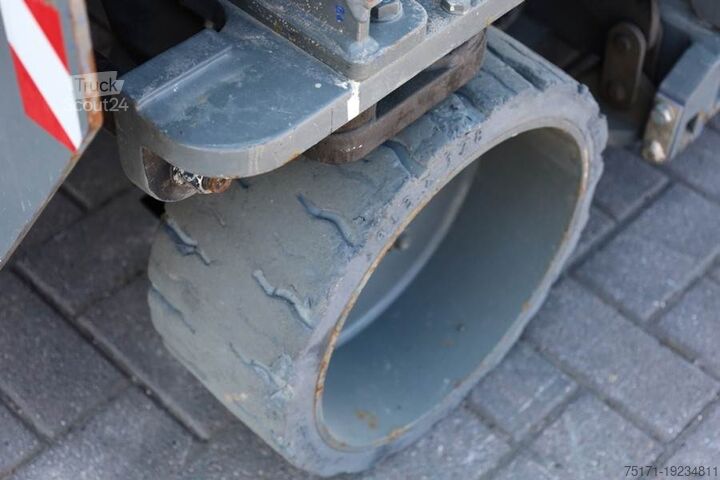 Ножичний підйомник Holland Lift Ecostar HL-9710 Electric, 12m Working Height, 325k