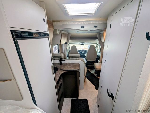 Teilintegriertes Wohnmobil BÜRSTNER B66 TD 690 G Hubbett