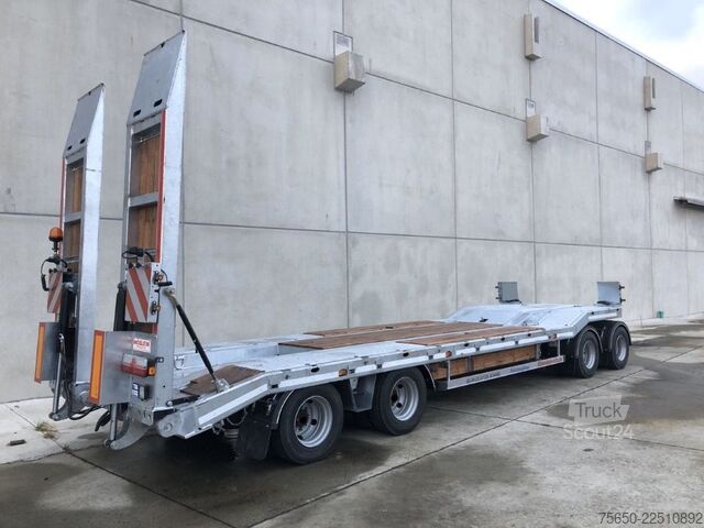 Низькорамний причіп Möslein T 4 VB H1 1 neuer 4 Achs Tieflader hydraulischen Rampen