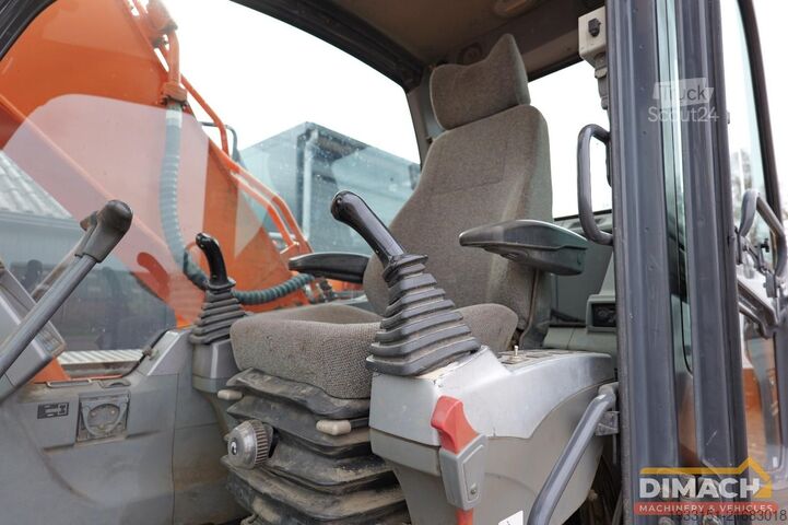 Bagger Doosan DX 180 LC produceert in Belgie - monogiek - 6 c...