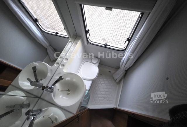 Альковный автодом WEINSBERG Orbiter A 591 G - Etagenbetten - Garage - Solar