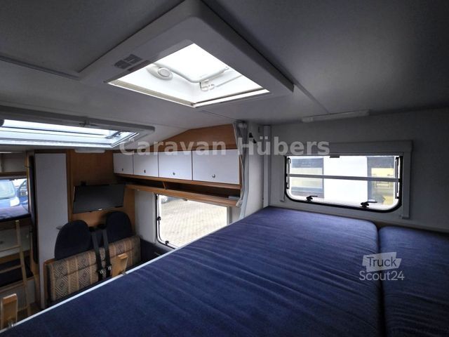 Альковный автодом WEINSBERG Orbiter A 591 G - Etagenbetten - Garage - Solar