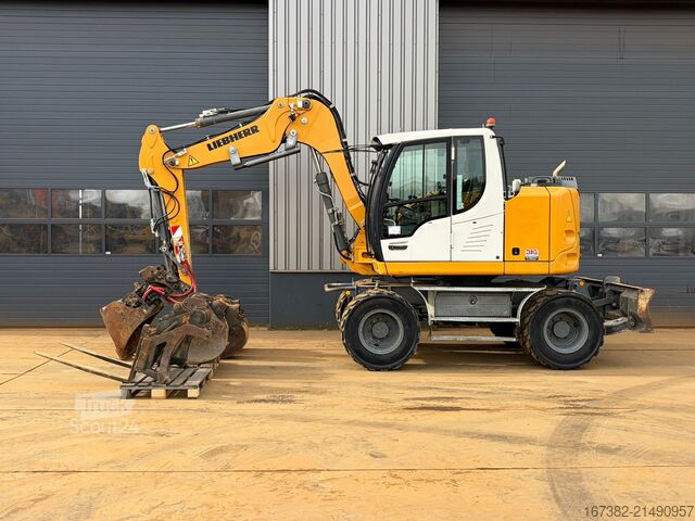 Bager na točkovima Liebherr 910