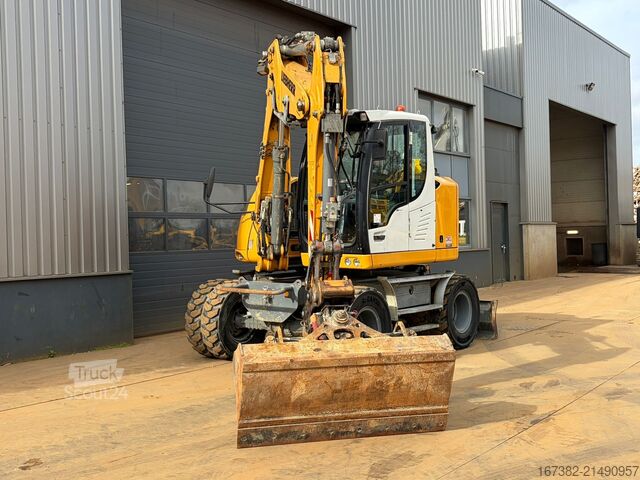 Bager na točkovima Liebherr 910