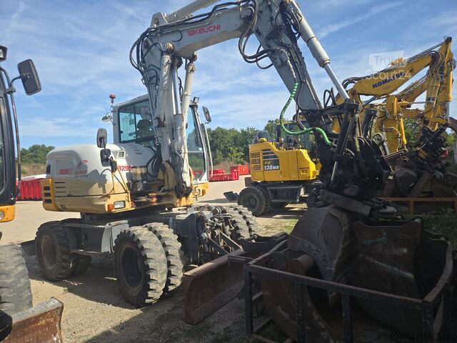 Kolesni bager Takeuchi TB295W