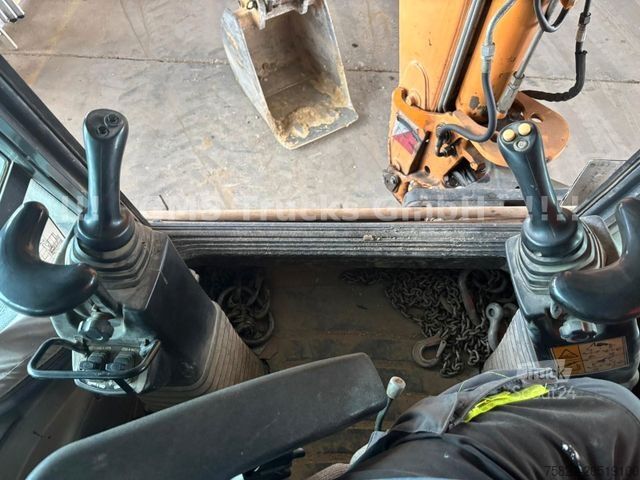 Backhoe loader CASE 695 / Baggerlader Skip / German 1. Hand