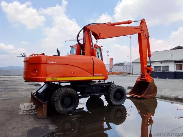 Wheel excavator Caterpillar M 318 D / SW / Schild