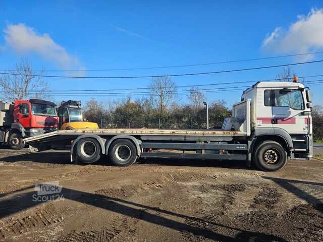 Camión porta máquinas MAN TGA 28.310