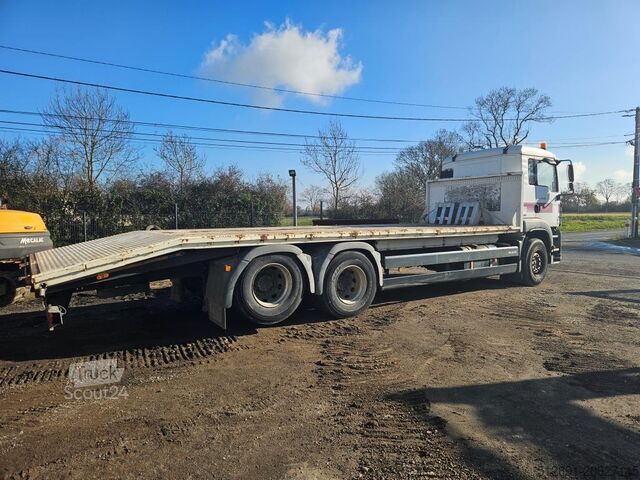 Camión porta máquinas MAN TGA 28.310