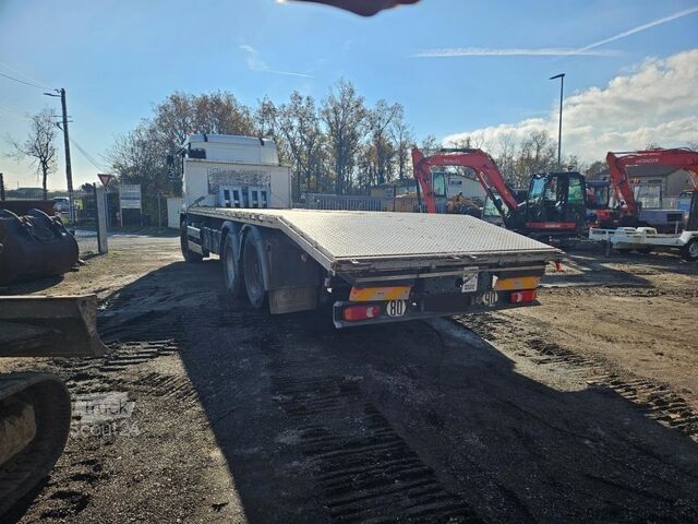 Camión porta máquinas MAN TGA 28.310