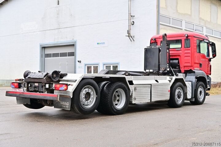 Kanca kasalı yük kamyonu (roll-off) MAN TGS35.440 Hydrodrive 8x2 4 Lift Lenk