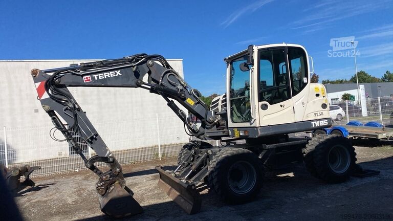 Riteņu ekskavators Terex Tw 85 Schaeff with 3 buckets and forks